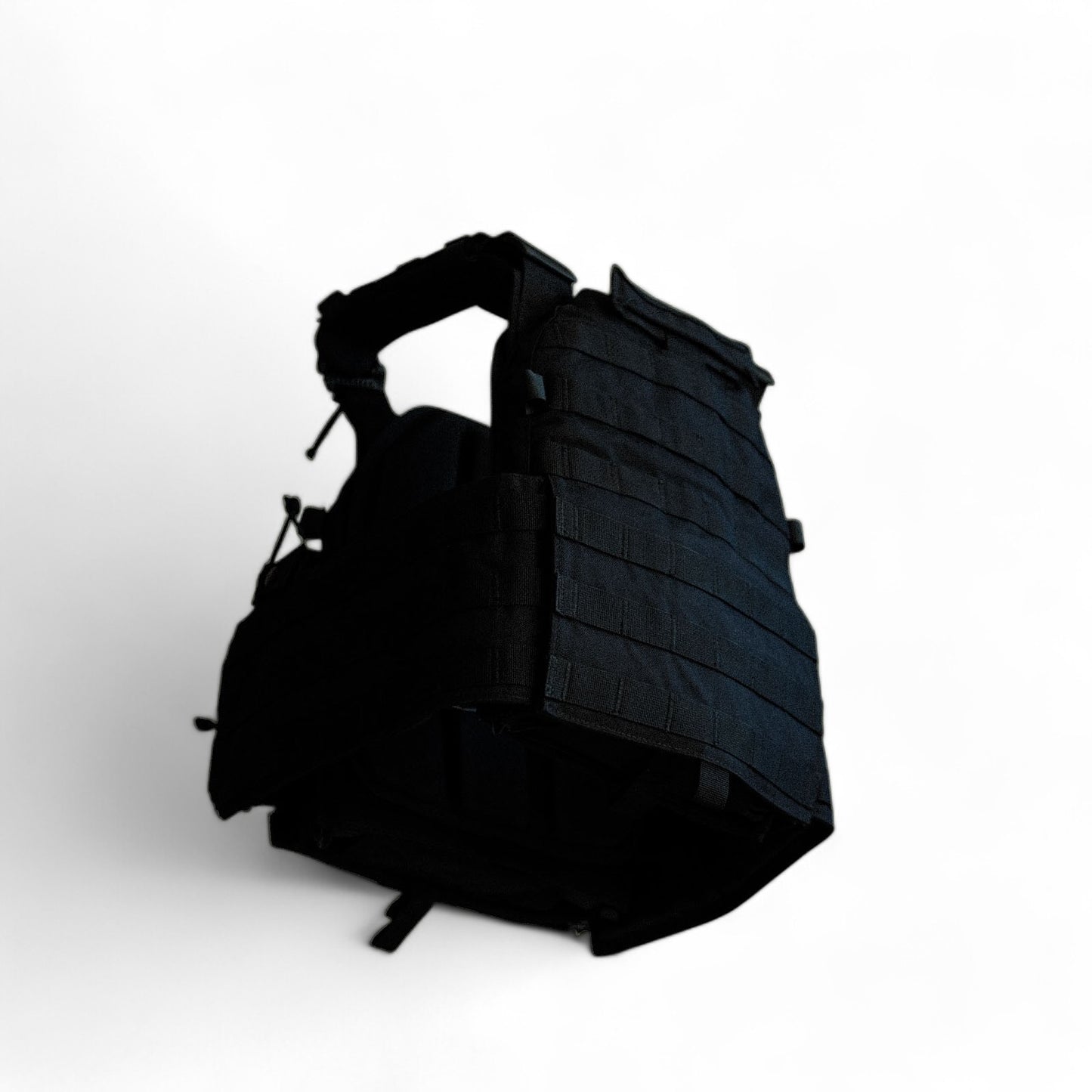 RED OpTec AMPC: Advanced Modular Plate Carrier in Black rear angled view featuring a front panel with triple mag pouches, MOLLE webbing for modular attachments, quick-release buckles, and side-mounted utility storage.