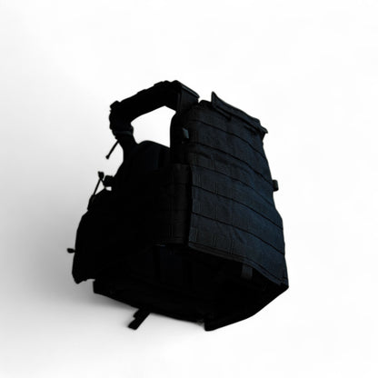 RED OpTec AMPC: Advanced Modular Plate Carrier  in Black rear angled view featuring a front panel with triple mag pouches, MOLLE webbing for modular attachments, quick-release buckles, and side-mounted utility storage.